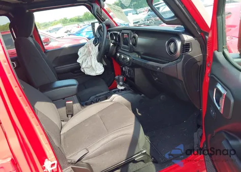 2023 Jeep Wrangler 4-Door Sport S 4X4 z USA, uszkodzony, nr VIN 1C4HJXDN5PW701929